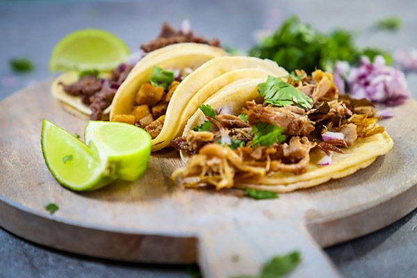 Cumin and Ancho Chicken on flower tortilla with the Mexican cheese
